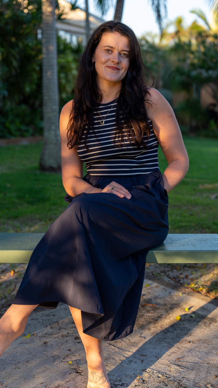 Roisin relaxing outdoors in the Australian evening light